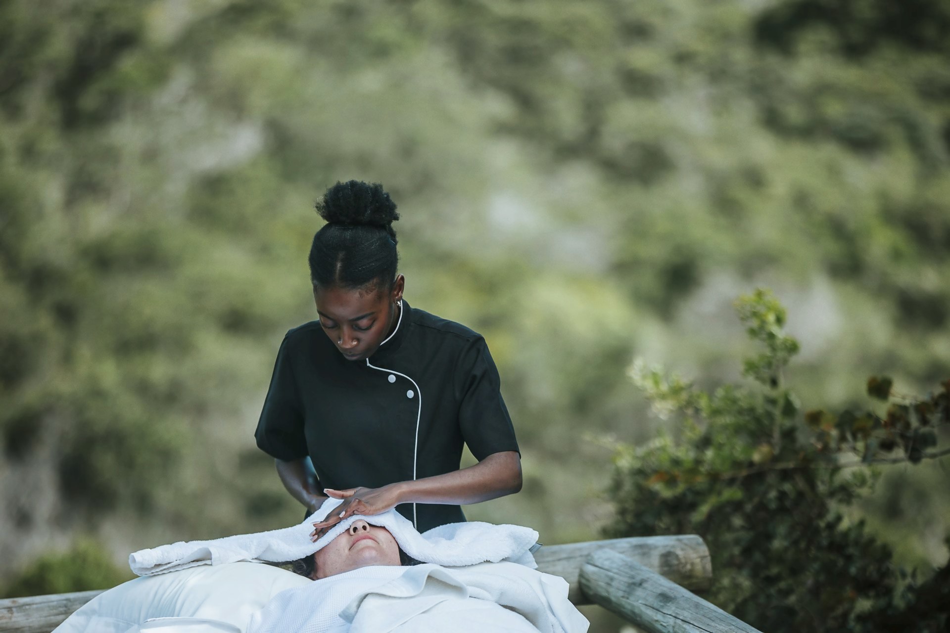 An outdoor massage at Sandcastle, the sounds of the bush all around